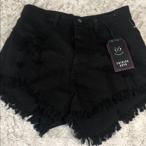Black distressed shorts